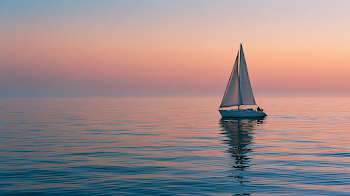 Dreamy Sunset Over Tranquil Ocean with Sailboat