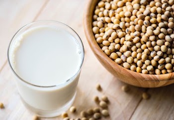 drinking glass filled with milk