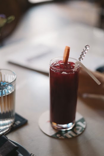 Drinking Glass Filled With Red Liquid