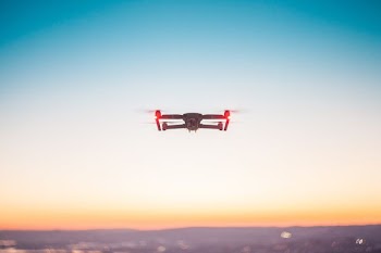 drone hoovering at daytime