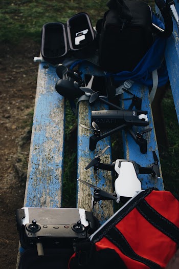 Drones On A Wooden Bench