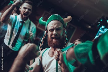 Drunk men fighting in a Saint Patrick's Day at pub
