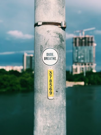 dude, breathe. a sticker we all need to read.