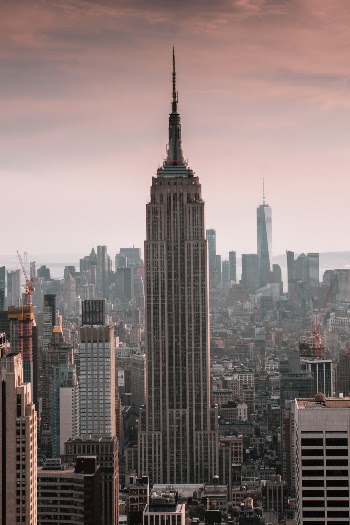 During my last visit in NYC we went to the top of the Rockefeller Center and stayed there till sunset. 
Got this amazing shot and the following in the darkness.