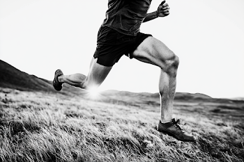 Dynamic Black and White Athletic Runner in Motion
