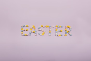 Easter Written In Chocolate Eggs On Purple Background