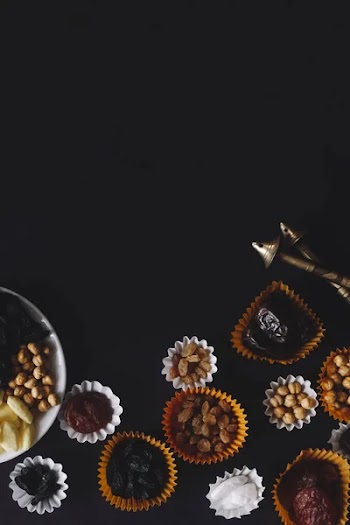 Eid Mubarak. Different iftar sweets. Celebrating Eid Al Adha. Islamic traditional holiday. Eid al-Fitr. Holly month Ramadan. Middle Eastern religious holiday. Dried date fruit. Flat lay, top view.