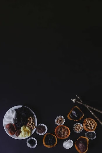 Eid Mubarak. Different iftar sweets. Celebrating Eid Al Adha. Islamic traditional holiday. Eid al-Fitr. Holly month Ramadan. Middle Eastern religious holiday. Dried date fruit. Flat lay, top view.