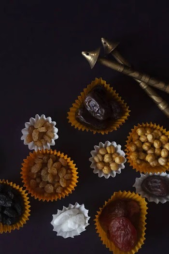 Eid Mubarak. Different iftar sweets. Celebrating Eid Al Adha. Islamic traditional holiday. Eid al-Fitr. Holly month Ramadan. Middle Eastern religious holiday. Dried date fruit. Flat lay, top view.