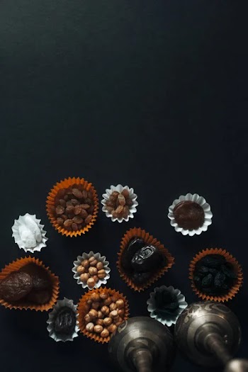 Eid Mubarak. Different iftar sweets. Celebrating Eid Al Adha. Islamic traditional holiday. Eid al-Fitr. Holly month Ramadan. Middle Eastern religious holiday. Dried date fruit. Flat lay, top view.