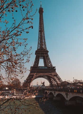 Eiffel Tower in Paris Under a Calm Blue Sky