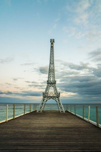 Eiffel Tower Miniature on Wooden Docks