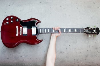 Electric Guitar Held High