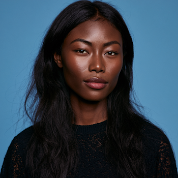 Elegant Asian Woman with Black Skin Against Blue Background