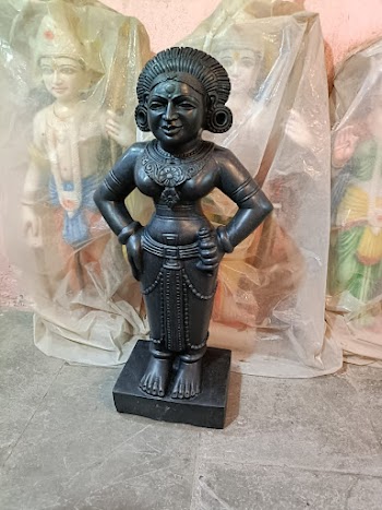 Elegant Black Statue of Deity