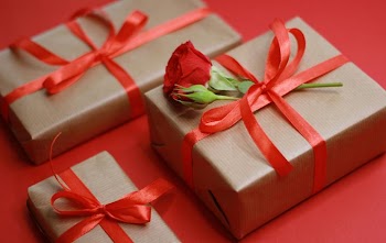 Elegant Gift Boxes with Red Ribbon and Rose