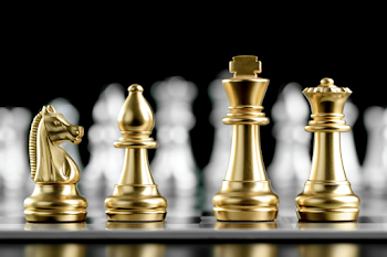 Elegant Gold Chess Pieces on Glossy Board