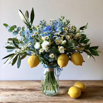 Elegant Mediterranean Floral Arrangement with Lemons