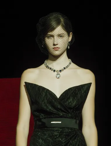 Elegant Model in Black Dress at Fashion Week Elegant Model in Black Dress at Fashion Week