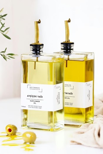 Elegant Olive Oil Bottles on a Minimalist Kitchen Counter