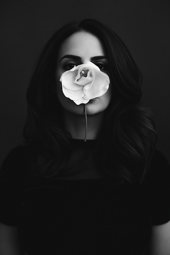 Elegant Portrait of a Woman with Flower