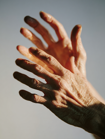 Elegant Silhouette of Relaxed Hands in Backlight
