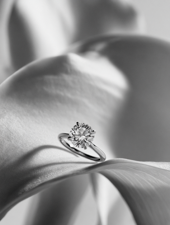 Elegant Solitaire Engagement Ring on Calla Lily