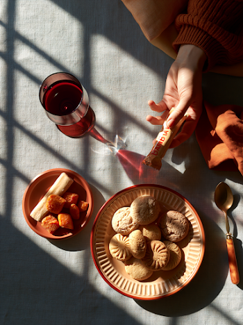 Elegant Table Setting with Snacks and Wine