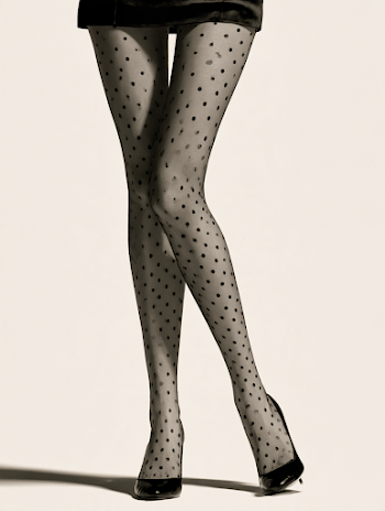 Elegant Woman's Legs in Polka Dot Tights and Heels