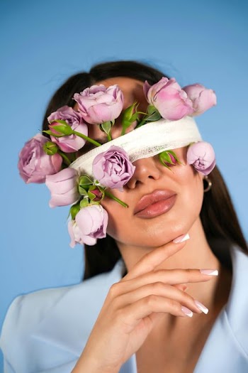 Elegant Woman with Floral Blindfold