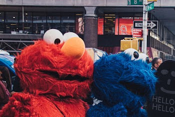 Elmo and Cookie Monster Mascots