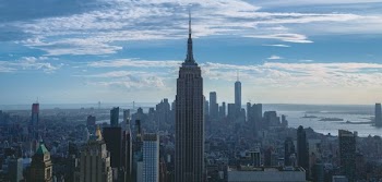 Empire State Building With Clouds In Distance