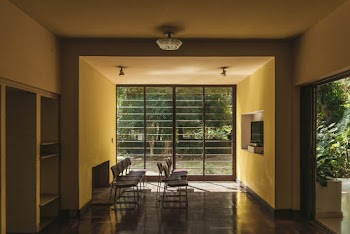 Empty Chairs in Front of Turned-off Television