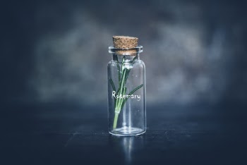 Empty Clear Glass Bottle