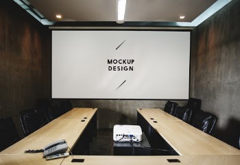 Empty Conference Room With Canvas Projector Monitor