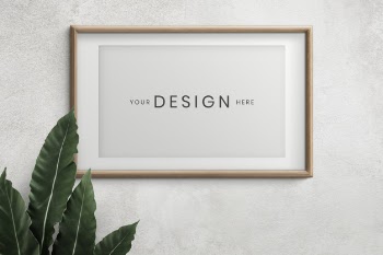 Empty frame on a wall Free Psd