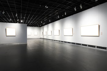 empty frames in a room against a white wall