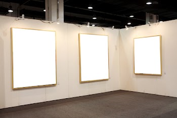 empty frames in a room against a white wall