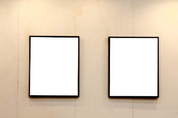 empty frames in a room against a white wall