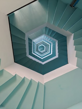 Empty Gray and White Concrete Spiral Stairs · Free Stock Photo
