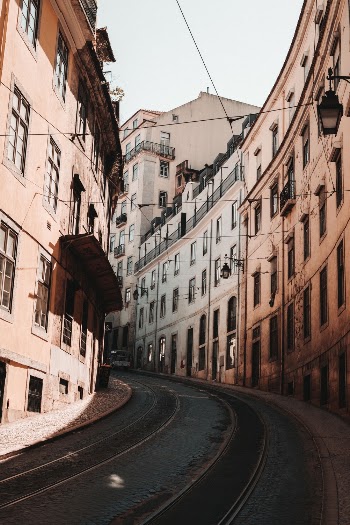 Empty Road Between Buildings