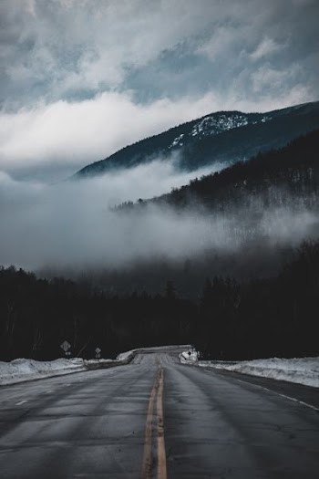 empty road facing mountain