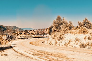 Empty Road Under Blue Sky