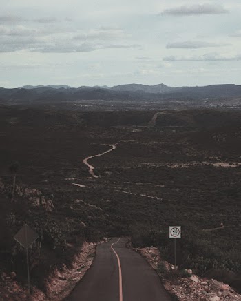 Empty Road Under White Sky