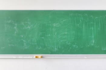 Empty school green chalkboard Free Photo