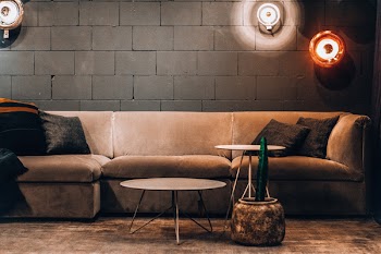 Empty Sofa Beside Wall