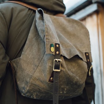Enamel Pin on Vintage Backpack