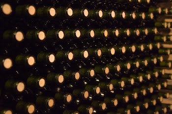 endless stack of wine bottles