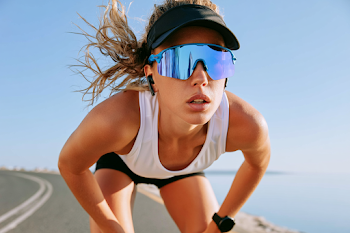 Endurance Athlete Taking a Break on Scenic Path