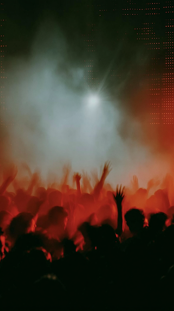 Energetic Club Scene with Silhouetted Crowd